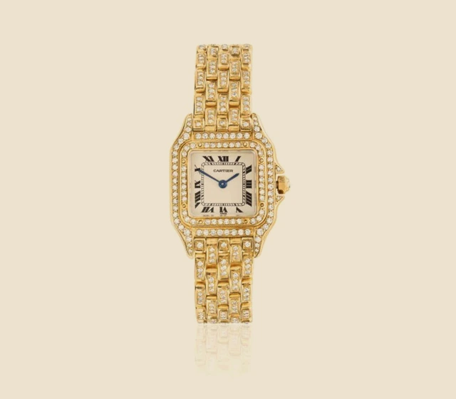 Montre de dame en or jaune et diamants